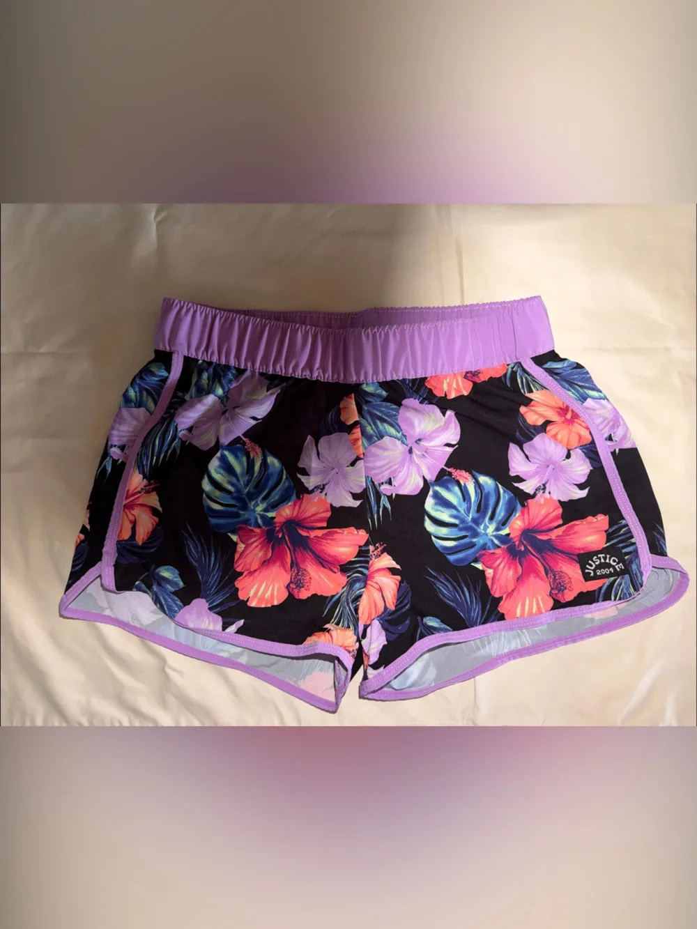 Justice Black Floral Swim Trunks with Purple Trim